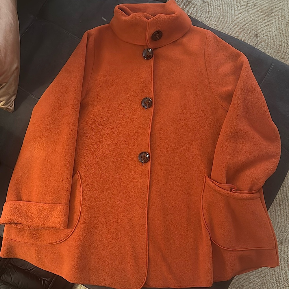 Classic fleece swing coat with stylish details.